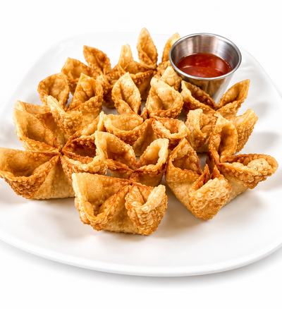 Crab rangoon with cream cheese and sweet chili sauce — Thai appetizers Billings Montana